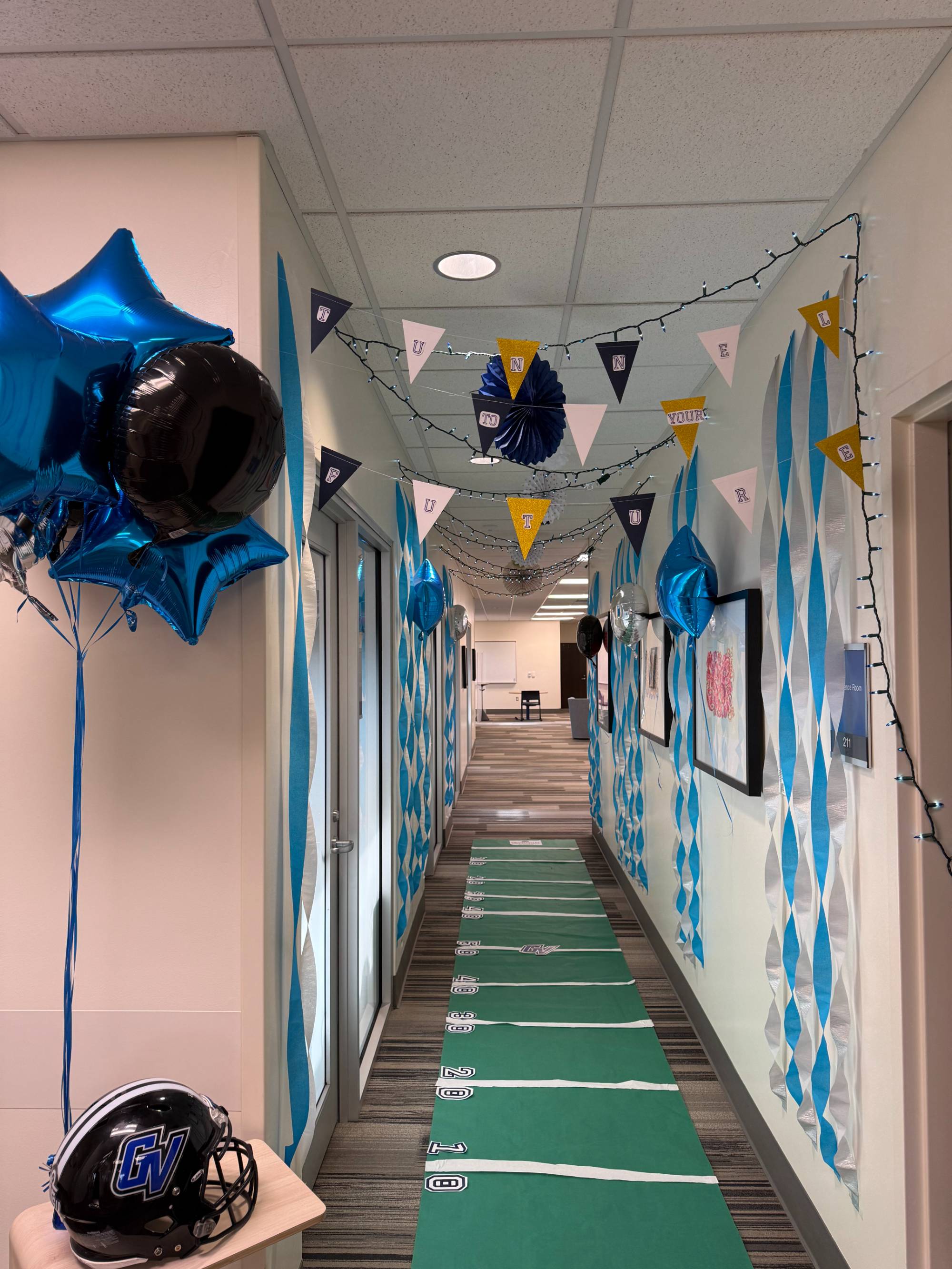 OSSB Homecoming decorations, office hallway turned into a football field, close up